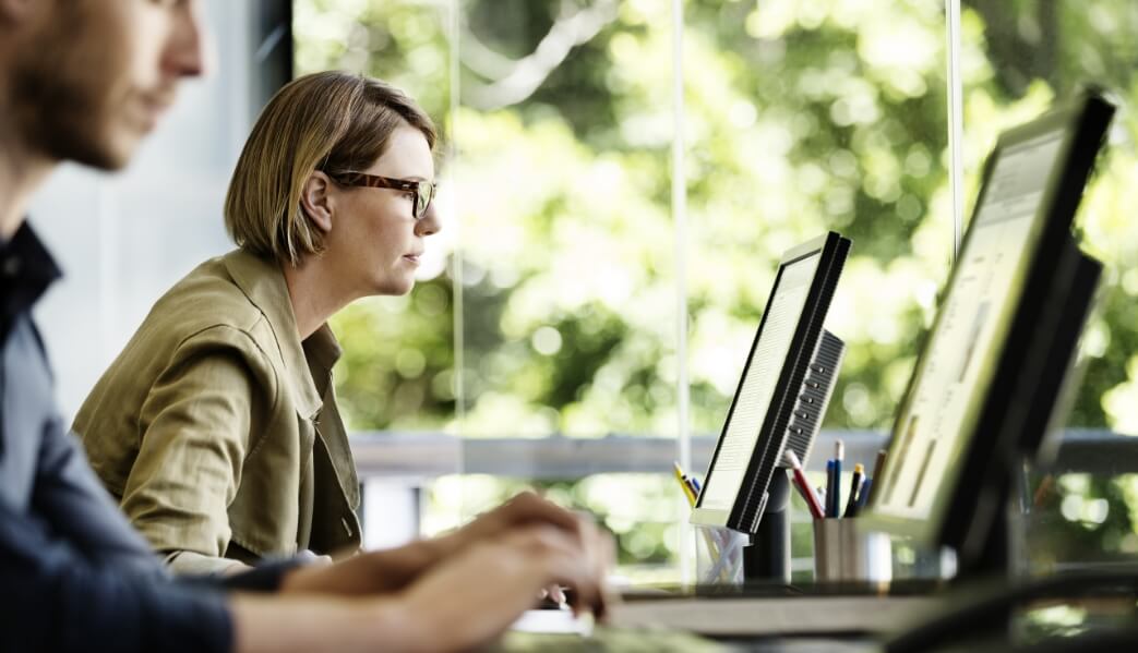 Woman looking at computer screen