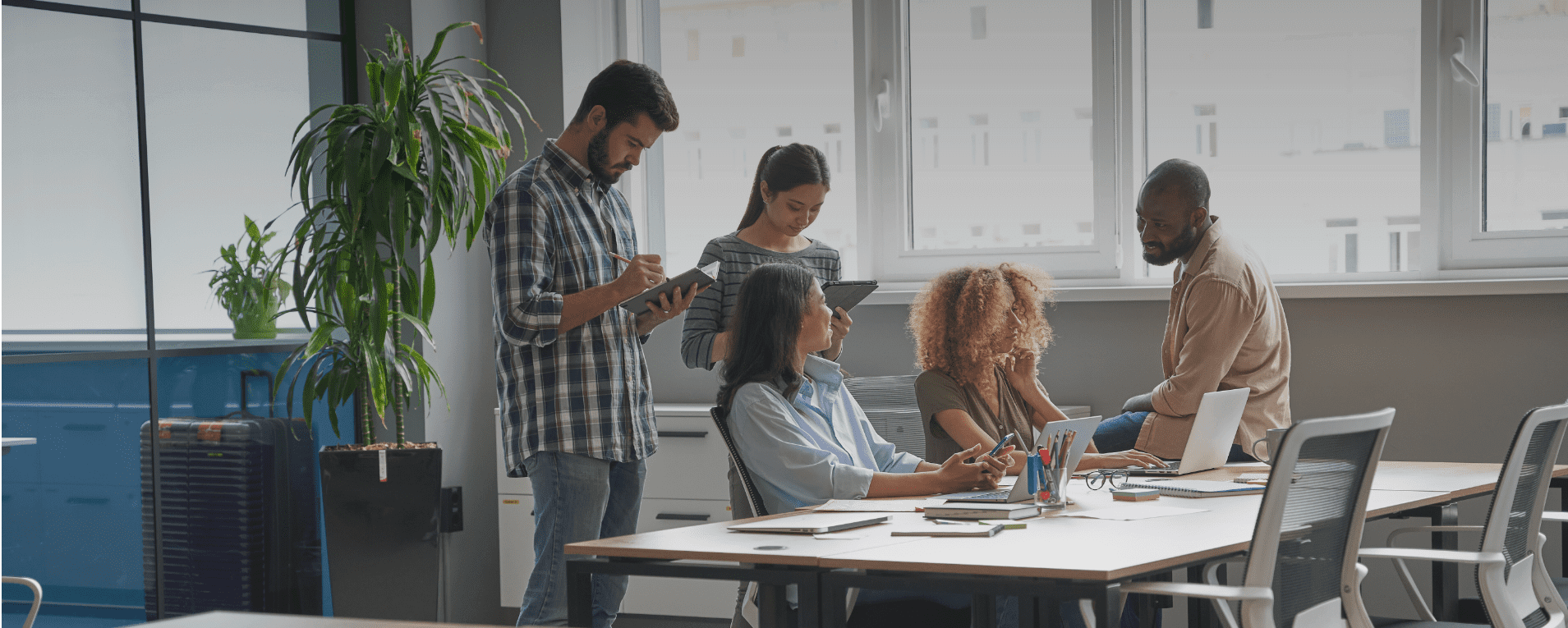People around a desk