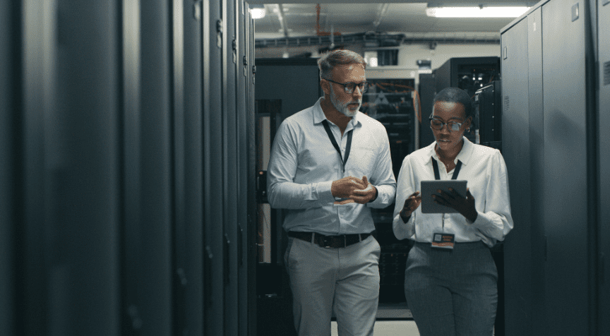 Man and woman in data centre