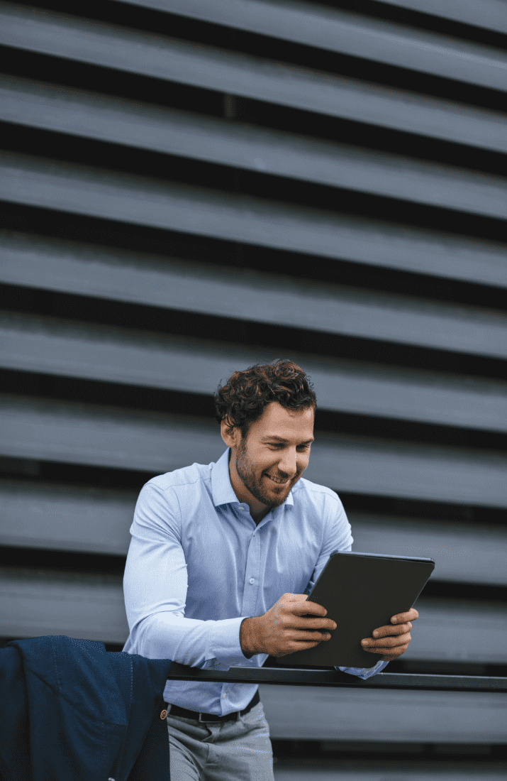 Man looking at tablet