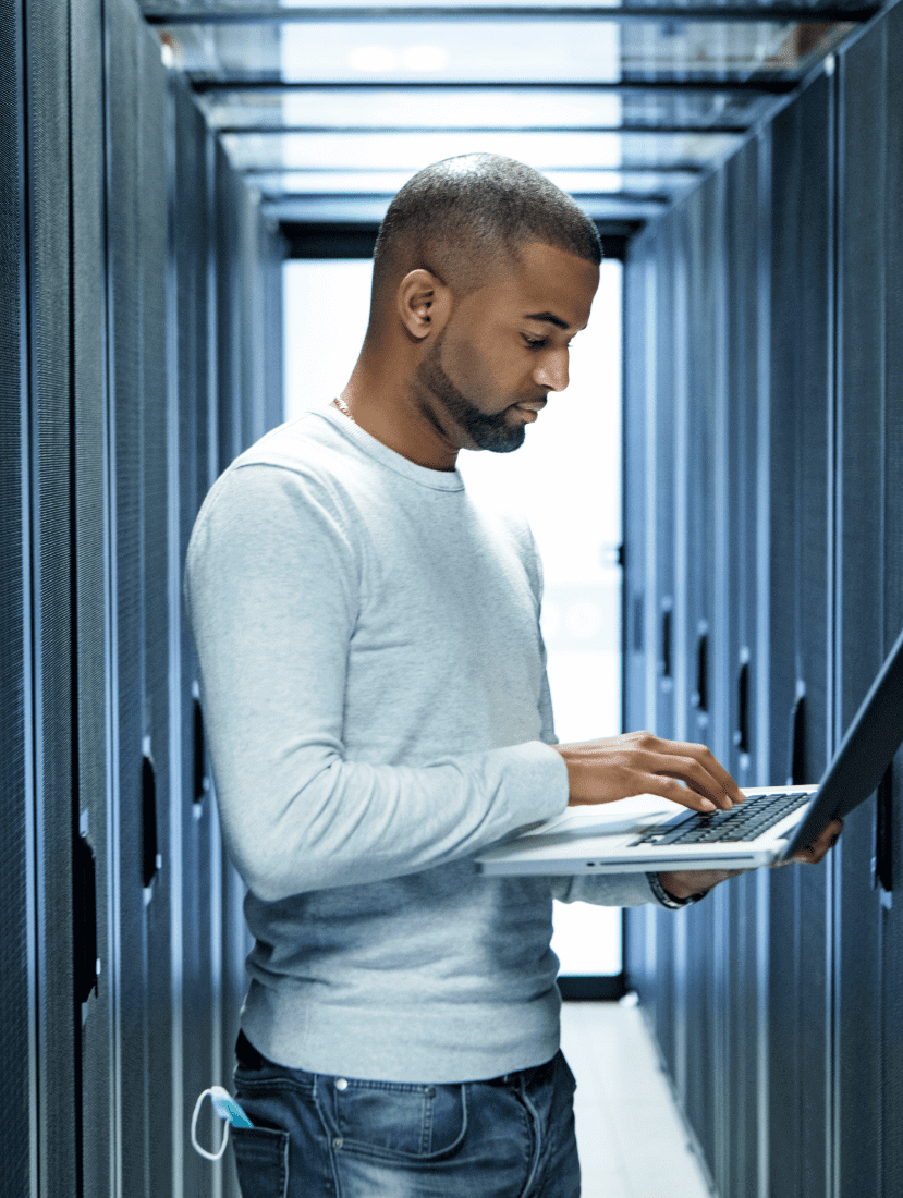 Man typing on laptop