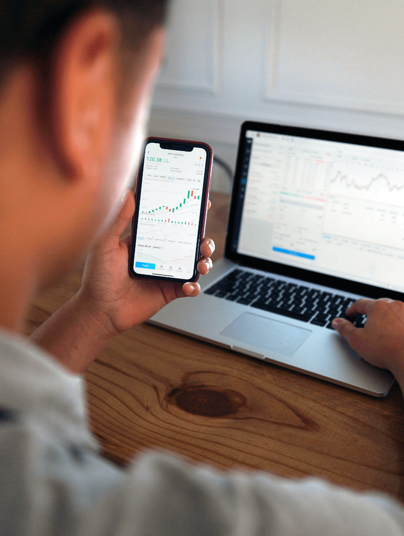Trading on mobile and laptop