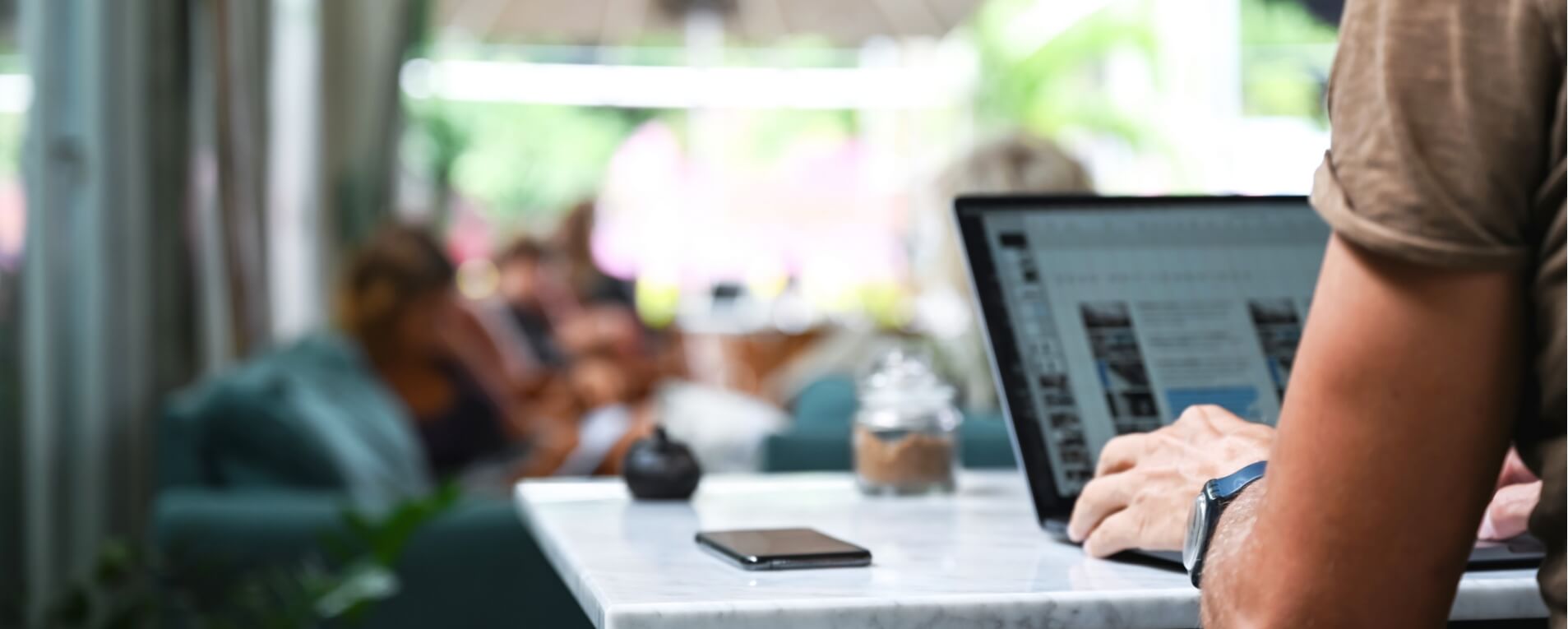 Person using laptop in office