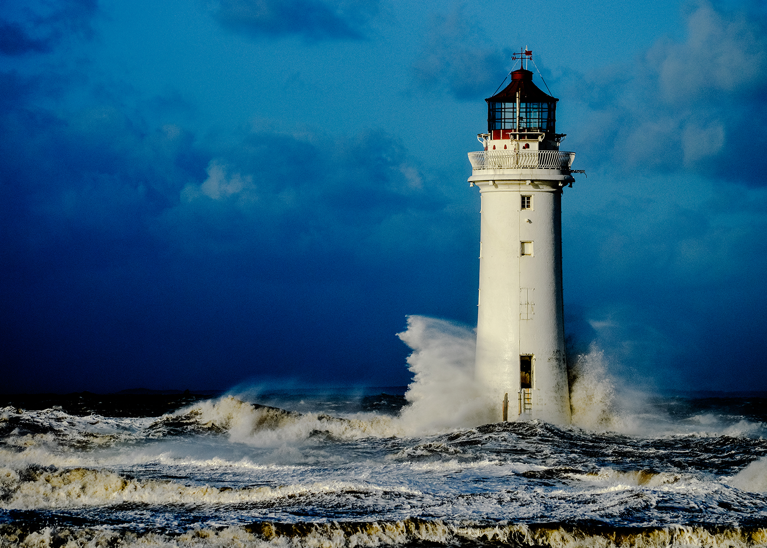 Lighthouse weathering the storm