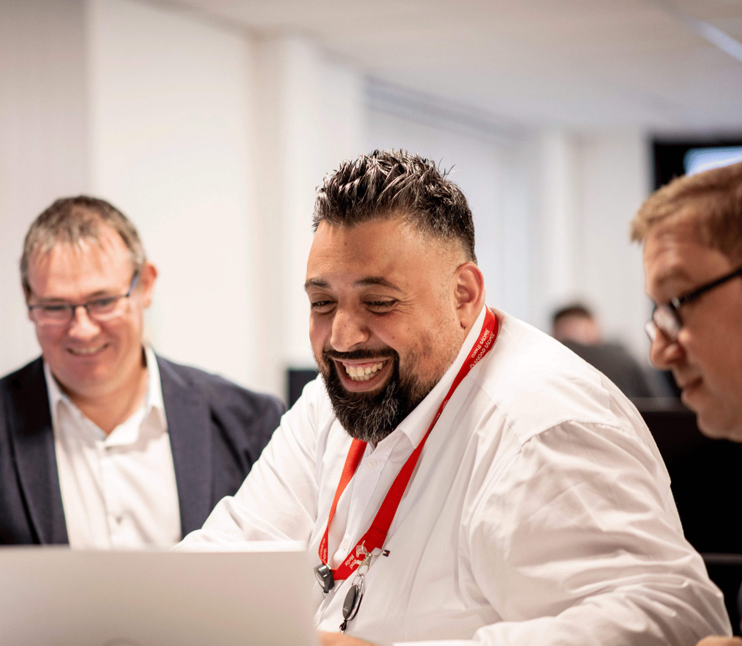 Red Helix employees collaborating